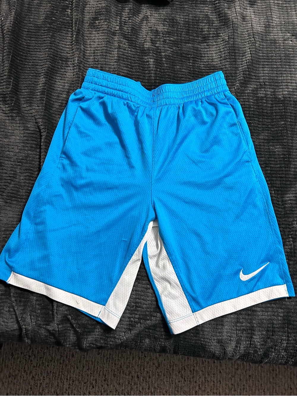 11. Nike Boy’s Bright Blue Athletic Shorts with White Accent
